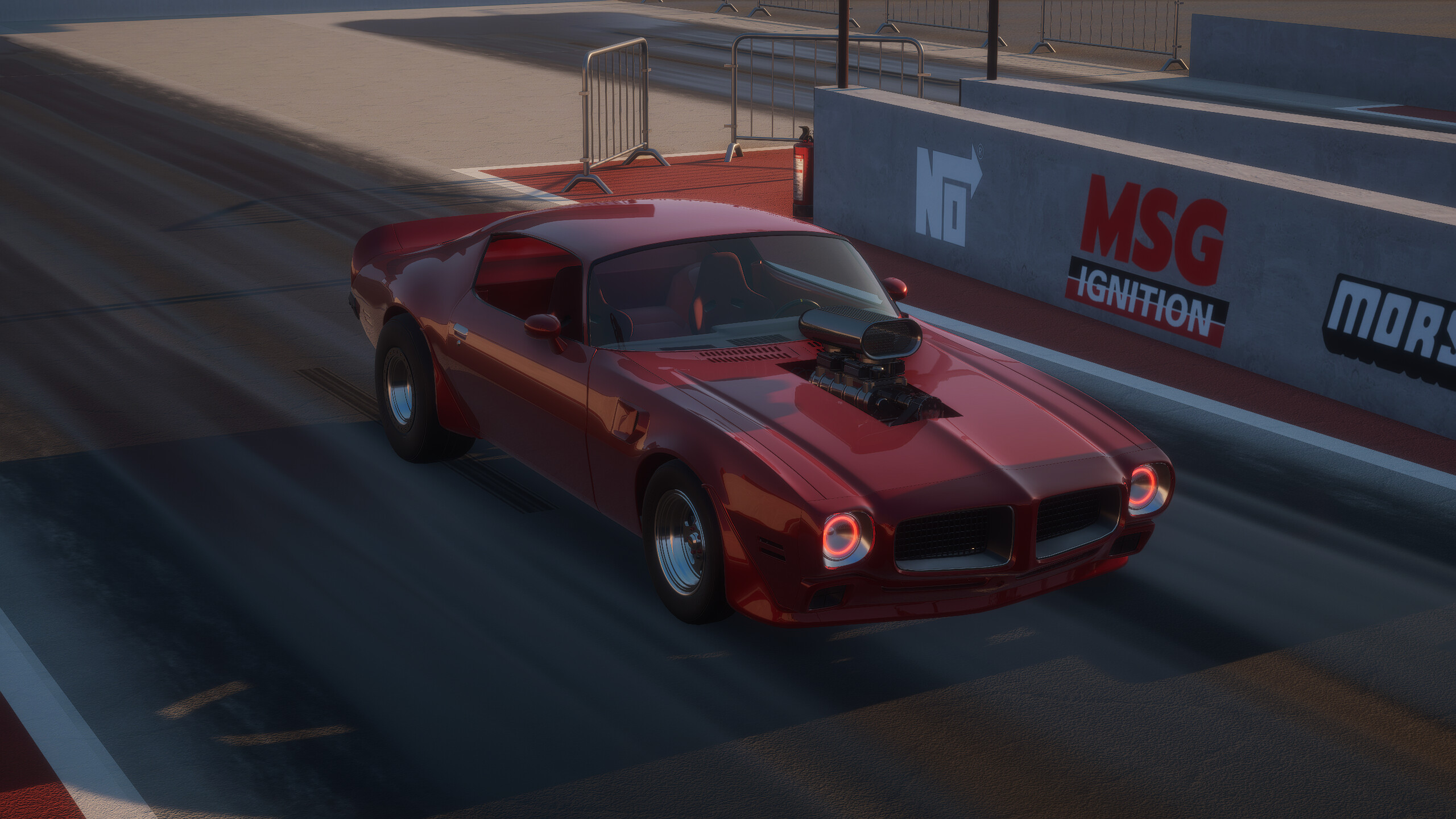 Breakout Garage drag car staging on the strip at dusk