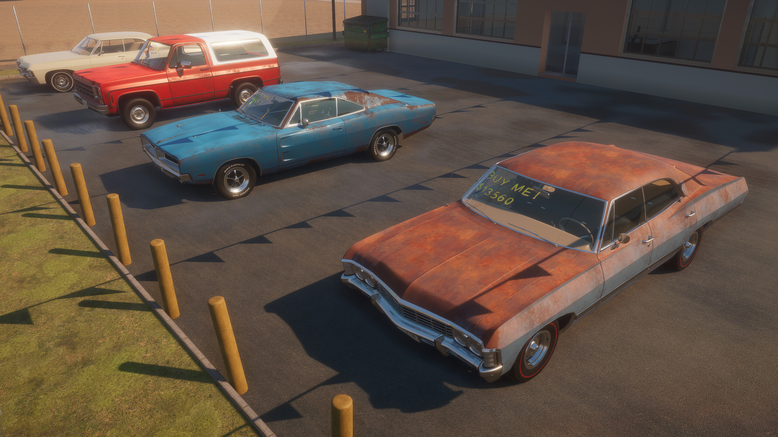 Used cars for sale at a Breakout Garage dealership, one marked BUY ME